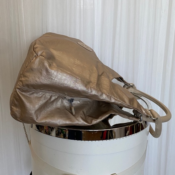 Kipling Metallic Champagne Hobo Bag with Polka Dot Interior - Picture 7 of 17